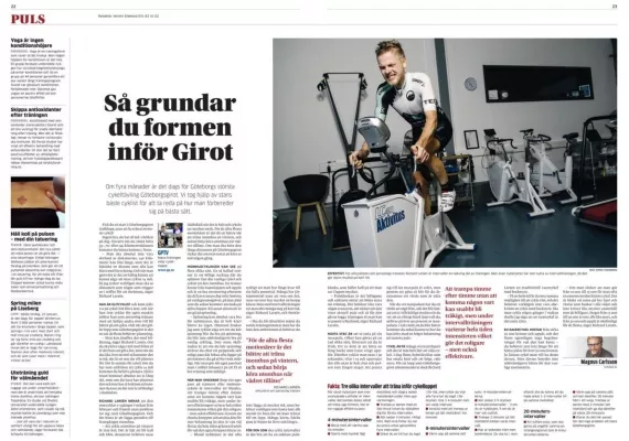 Man cyklar på en stationär cykel i en gymmiljö, omgiven av träningsutrustning. Svensk text följer med bilden på en tidningslayout.